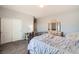 Bedroom with a decorative iron bed frame, neutral-toned walls and plush carpet at 1113 Via Della Costrella, Henderson, NV 89011