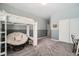 Bedroom with a lofted bed, neutral-toned walls and plush carpet for added comfort at 1113 Via Della Costrella, Henderson, NV 89011