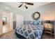 Neutral guest bedroom with stylish decor, plush carpeting, and closet at 1113 Via Della Costrella, Henderson, NV 89011