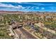 Elegant community entrance with palm trees, showcasing the welcoming neighborhood atmosphere at 1113 Via Della Costrella, Henderson, NV 89011