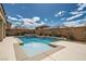 Sparkling pool and spa with brick surround, perfect for relaxing or entertaining guests at 1113 Via Della Costrella, Henderson, NV 89011