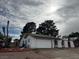 Inviting single story home featuring a garage, desert landscaping, and unique arches at 1126 Azul Way, Boulder City, NV 89005