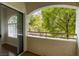 Charming balcony offering a serene outdoor escape and scenic views through sliding glass doors at 1420 Red Crest Ln # 202, Las Vegas, NV 89144
