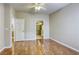 Comfortable bedroom with bathroom access and laminate wood flooring at 1420 Red Crest Ln # 202, Las Vegas, NV 89144