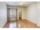 Inviting bedroom with laminate wood flooring, ceiling fan and walk-in closet at 1420 Red Crest Ln # 202, Las Vegas, NV 89144