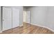 Spacious bedroom with beautiful flooring, closet, and open doorway to other living space at 1420 Red Crest Ln # 202, Las Vegas, NV 89144