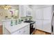 Well lit kitchen features modern appliances and countertops at 1420 Red Crest Ln # 202, Las Vegas, NV 89144