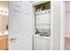 Convenient laundry closet with stackable washer and dryer for space-saving efficiency at 1420 Red Crest Ln # 202, Las Vegas, NV 89144