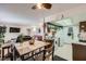 Open-concept kitchen and dining area with laminate floors and a full appliance package at 1420 Vegas Valley Dr # 22, Las Vegas, NV 89169