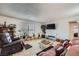 A spacious living room featuring comfortable seating, neutral carpet, and large window with natural light at 1420 Vegas Valley Dr # 22, Las Vegas, NV 89169