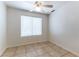 Cozy bedroom with tile flooring and a ceiling fan at 1570 Jamielinn Ln # 104, Las Vegas, NV 89110
