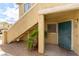 Inviting apartment exterior with an open stairway and security door at 1570 Jamielinn Ln # 104, Las Vegas, NV 89110