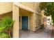 Condo exterior featuring a secure entrance and landscaped surroundings at 1570 Jamielinn Ln # 104, Las Vegas, NV 89110