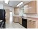 Bright kitchen with stainless steel appliances and tile flooring at 1570 Jamielinn Ln # 104, Las Vegas, NV 89110