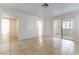 Open-concept living space with tile flooring and natural light at 1570 Jamielinn Ln # 104, Las Vegas, NV 89110