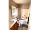 Bathroom with wood vanity, toilet and tub/shower, designed for convenience and comfort at 1612 Lefty Garcia Way, Henderson, NV 89002
