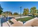 Outdoor bocce ball courts offer a fun activity with covered seating under mature landscaping at 2105 Poppywood Ave, Henderson, NV 89012