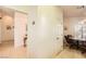 Neutral-toned dining room adjacent to the living area featuring a tiled floor at 2105 Poppywood Ave, Henderson, NV 89012
