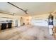 Functional two-car garage with storage solutions, including shelving, cabinets, and utility equipment at 2105 Poppywood Ave, Henderson, NV 89012