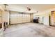 Spacious two car garage featuring shelving and plenty of storage space at 2105 Poppywood Ave, Henderson, NV 89012