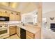 Kitchen with stainless appliances, gas range, and breakfast bar at 2105 Poppywood Ave, Henderson, NV 89012