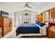 Cozy main bedroom featuring large windows and built in storage, creating a relaxing retreat at 2105 Poppywood Ave, Henderson, NV 89012