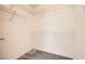 Walk-in closet with metal shelving throughout and neutral carpeting at 2105 Poppywood Ave, Henderson, NV 89012