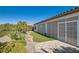 Backyard featuring drought tolerant landscaping including gravel, plants and artificial turf at 2372 Perrysburg Dr, Henderson, NV 89044