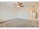 Bright, spacious bedroom with carpet flooring and shuttered windows at 2372 Perrysburg Dr, Henderson, NV 89044