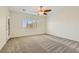 Neutral bedroom with shuttered windows and ample natural light, carpeted flooring at 2372 Perrysburg Dr, Henderson, NV 89044