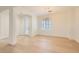 Elegant entryway showcasing a decorative glass door, chandelier, and shuttered window at 2372 Perrysburg Dr, Henderson, NV 89044