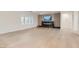 Open-concept living room featuring hardwood floors and a modern fireplace at 2372 Perrysburg Dr, Henderson, NV 89044