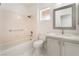 Comfortable full bathroom with combined shower and tub with vanity storage space and lighting at 2520 Springridge Dr, Las Vegas, NV 89134
