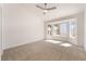 Bright bedroom with a ceiling fan and a large bay window at 2520 Springridge Dr, Las Vegas, NV 89134