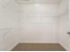 Walk-in closet featuring wire shelving and neutral colored floors at 2520 Springridge Dr, Las Vegas, NV 89134