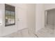 Bright foyer featuring marble floors, a window with blinds, and a white front door at 2520 Springridge Dr, Las Vegas, NV 89134