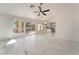 Open-concept living room featuring marble floors and a view of the kitchen and backyard at 2520 Springridge Dr, Las Vegas, NV 89134