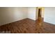 Bedroom with wood flooring provides a neutral palette for decor and leads to an en-suite bathroom at 2606 S Durango Dr # 172, Las Vegas, NV 89117