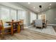 Charming dining area with large windows and a cozy breakfast nook with custom window shutters at 2705 Tumble Brook Dr, Las Vegas, NV 89134