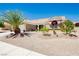 Attractive single-Gathering home featuring desert landscaping with a mature palm tree and a welcoming entrance at 2705 Tumble Brook Dr, Las Vegas, NV 89134