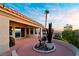 Open back patio area showcasing decorative landscaping and peaceful views of the surrounding horizon at 2742 Darby Falls Dr, Las Vegas, NV 89134