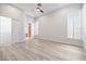 Spacious bedroom with modern flooring, shuttered windows, and natural light at 2742 Darby Falls Dr, Las Vegas, NV 89134