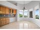 Sunlit breakfast nook with a bay window and custom cabinetry, perfect for morning coffee at 2742 Darby Falls Dr, Las Vegas, NV 89134