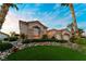 Charming single-story home with well-manicured landscaping, stone accents, and a two-car garage at 2742 Darby Falls Dr, Las Vegas, NV 89134