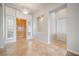 Entrance foyer with a chandelier and beautiful travertine flooring at 2742 Darby Falls Dr, Las Vegas, NV 89134