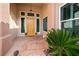 Inviting front entrance with a stone walkway and well-maintained landscaping at 2742 Darby Falls Dr, Las Vegas, NV 89134