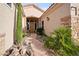 Inviting front entrance with decorative rock landscaping and a stone walkway leading to the beautiful front door at 2742 Darby Falls Dr, Las Vegas, NV 89134