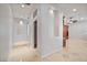 Hallway with travertine flooring and recessed lighting at 2742 Darby Falls Dr, Las Vegas, NV 89134