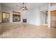 Inviting living room with a cozy fireplace, custom built-ins, and ample natural light at 2742 Darby Falls Dr, Las Vegas, NV 89134