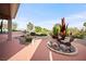 Desert landscaping on outdoor patio with rock features and mountain view at 2742 Darby Falls Dr, Las Vegas, NV 89134